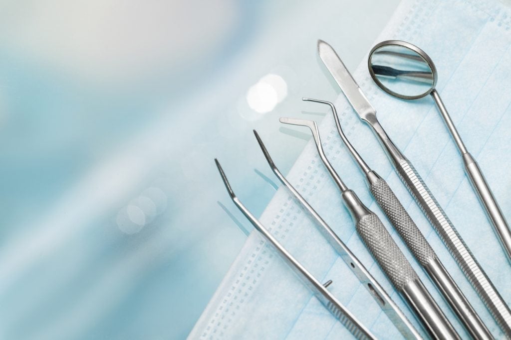 Dental tools on mask