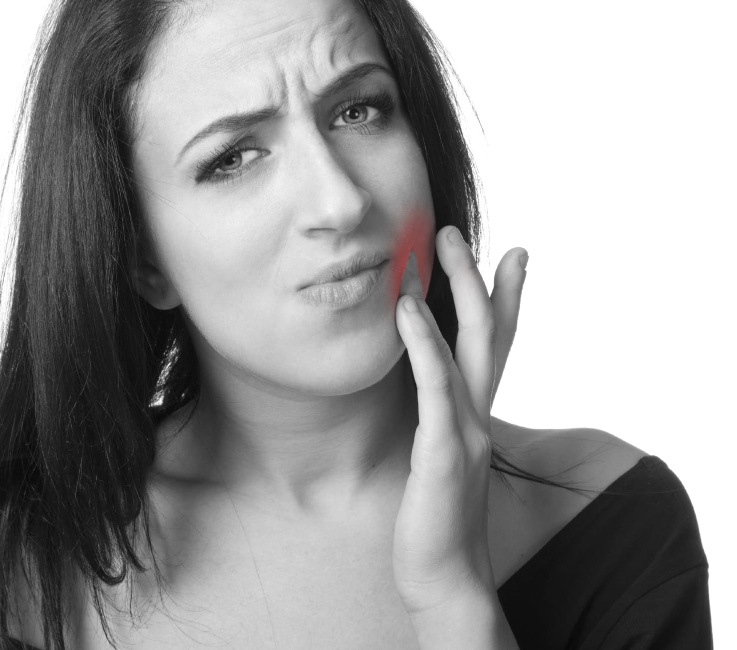 Adult woman holding jaw in pain